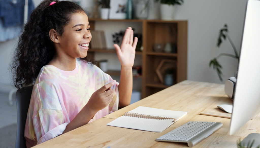 A kid attending online language course